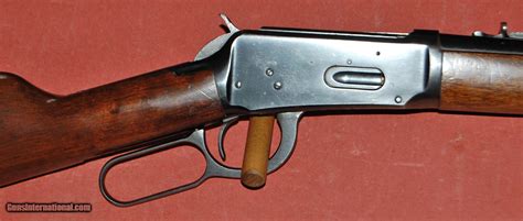 how to tell a pre 64 winchester model 94